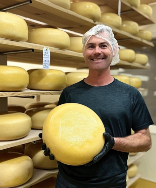 Steven Stiles Holding Nottingham Gouda